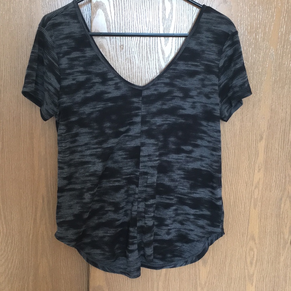 Loose fitting V-neck.